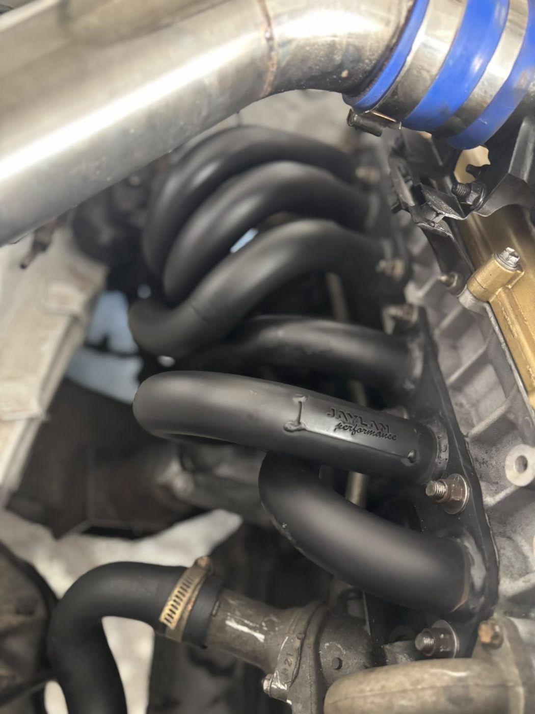 Ceramic coated turbo manifold on an engine