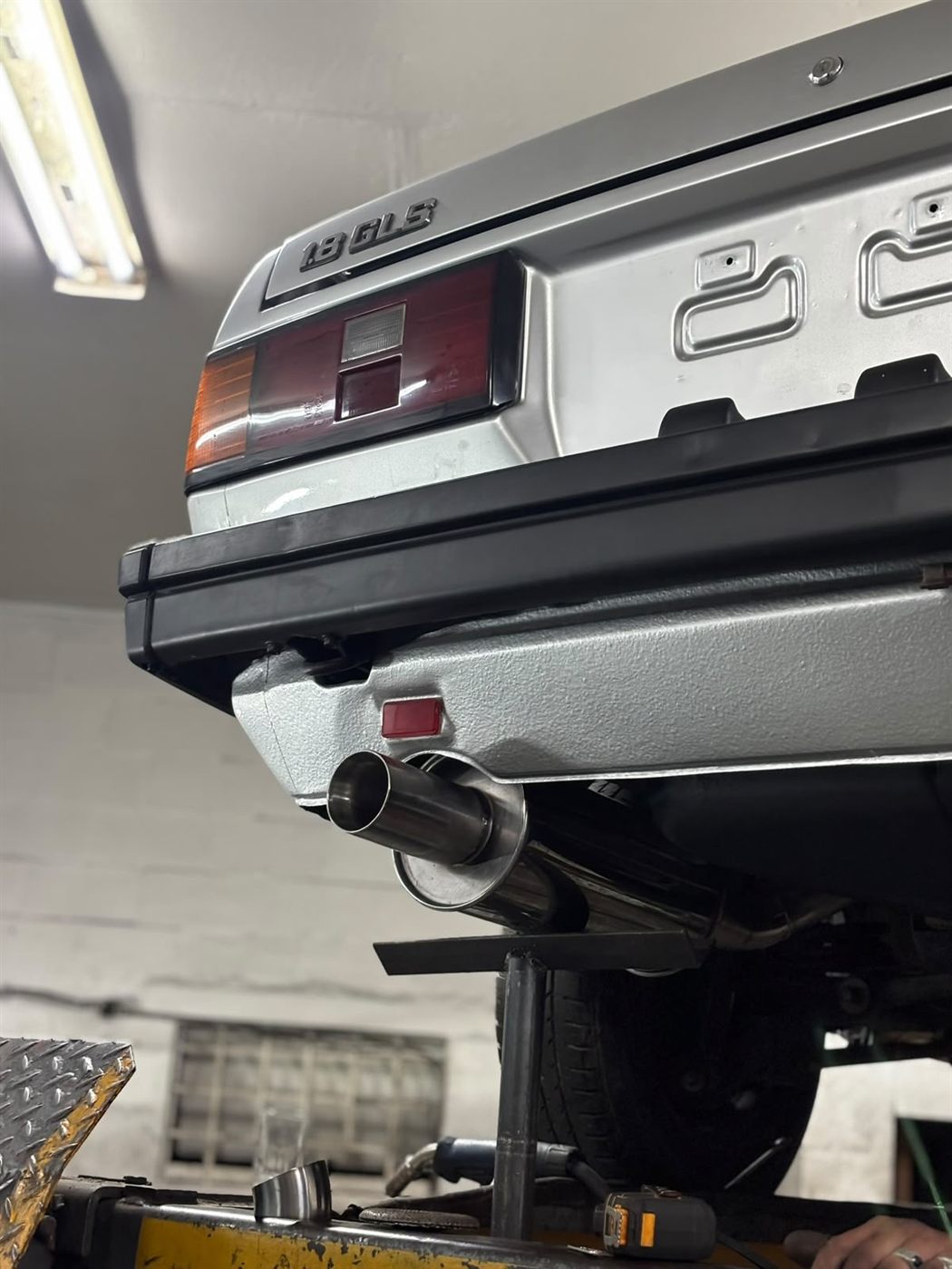 Rear exit tip on a finished car